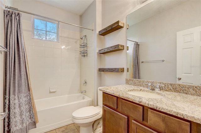 full bathroom with tile patterned floors, shower / bath combo, toilet, and vanity