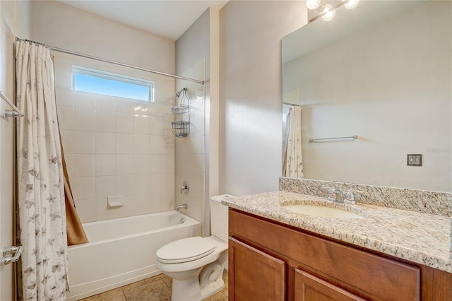 full bathroom featuring tile patterned floors, toilet, vanity, and shower / tub combo