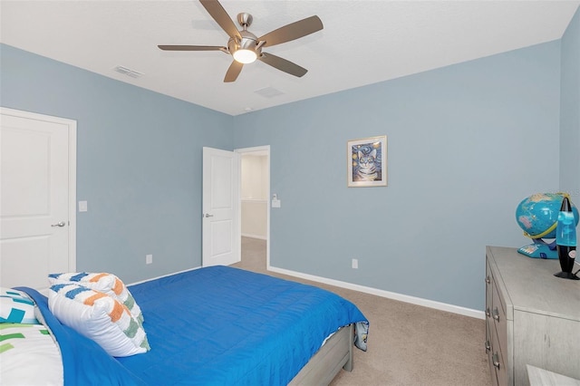 bedroom with light colored carpet and ceiling fan