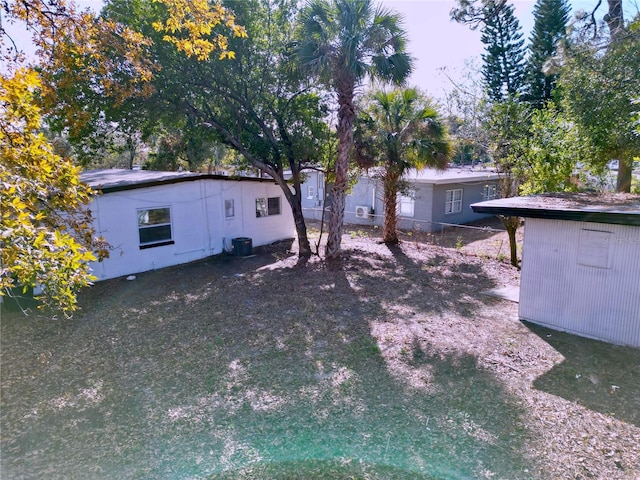 view of yard with central AC unit