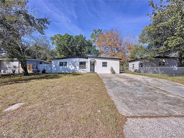 view of front of home with a front lawn