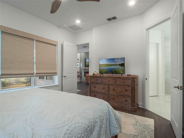 bedroom featuring dark wood-type flooring and ceiling fan