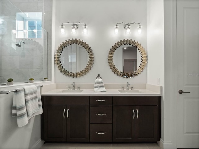 bathroom featuring vanity and a tile shower