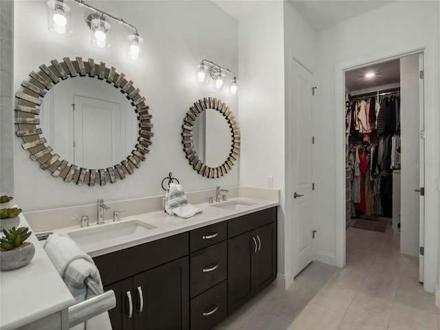 bathroom featuring vanity and tile patterned flooring