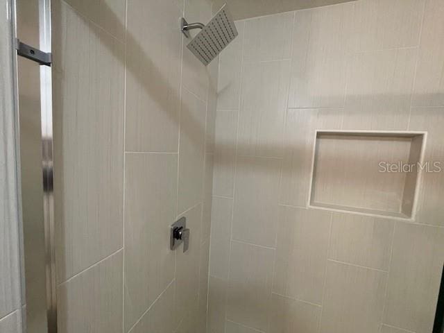 details featuring a tile shower