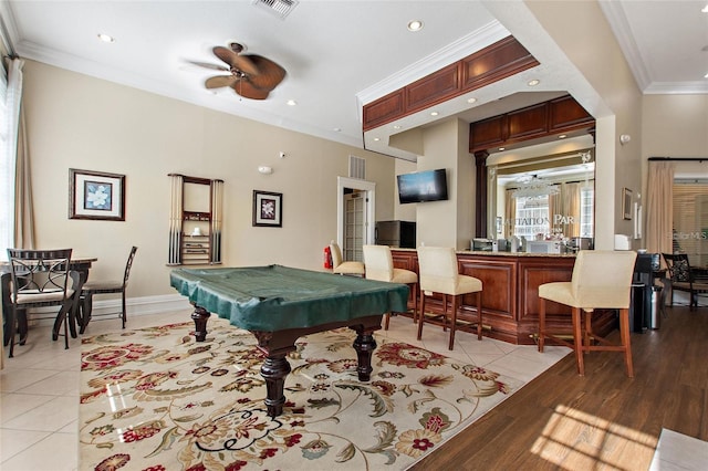 playroom with billiards, light tile patterned floors, ornamental molding, and ceiling fan