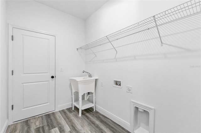 laundry room with washer hookup, hookup for an electric dryer, and dark hardwood / wood-style flooring