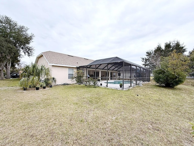 view of yard featuring glass enclosure