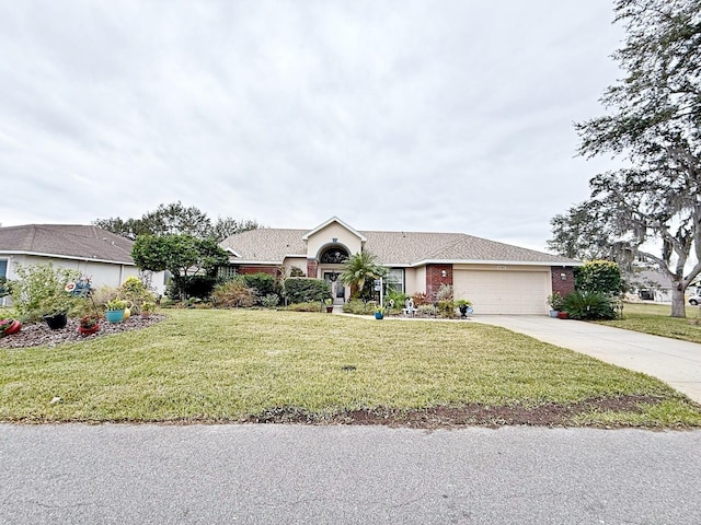 single story home featuring a garage and a front yard