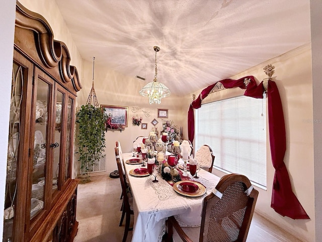 dining room with a chandelier