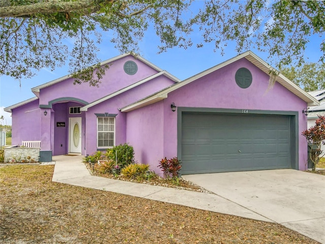 ranch-style house with a garage