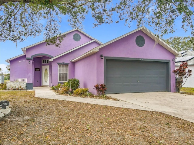 ranch-style home with a garage