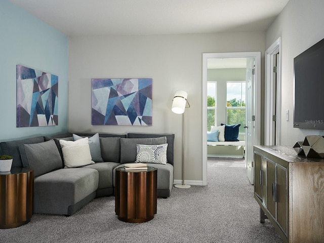 living room featuring light colored carpet