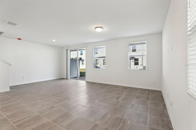 view of tiled spare room