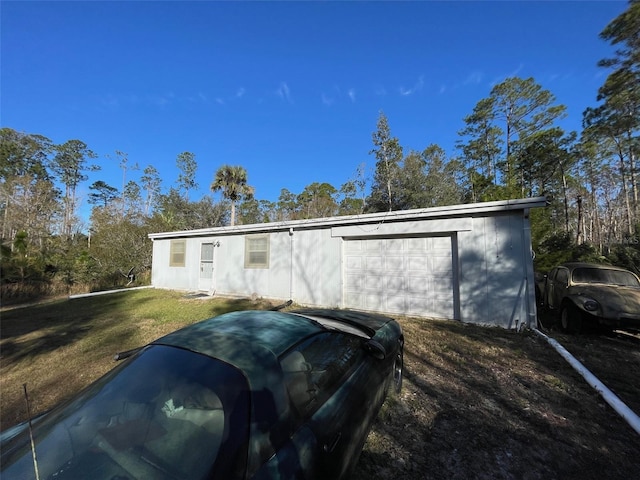 exterior space featuring a front lawn