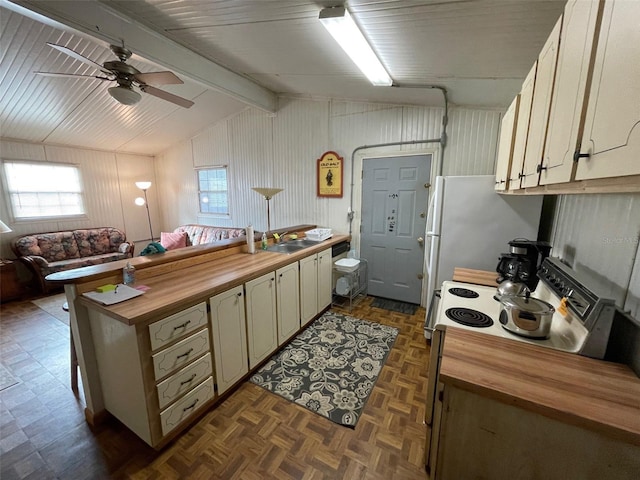 kitchen featuring wooden counters, ceiling fan, refrigerator, dark parquet flooring, and lofted ceiling with beams