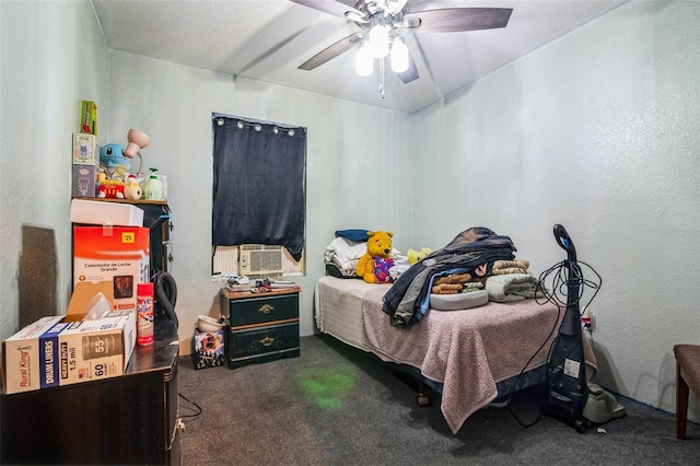 bedroom with dark carpet and ceiling fan