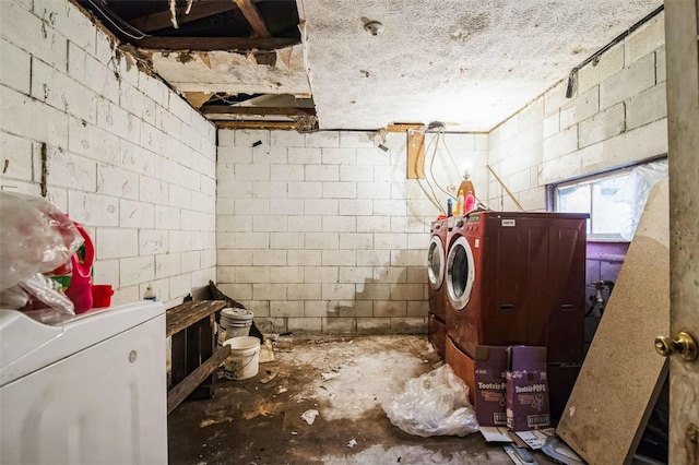 laundry area with washing machine and clothes dryer