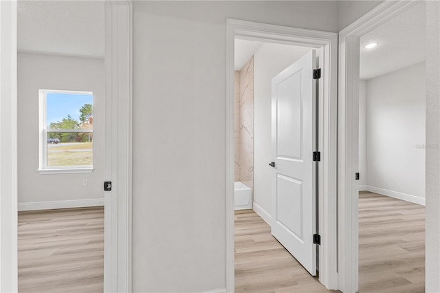 hallway featuring light hardwood / wood-style floors