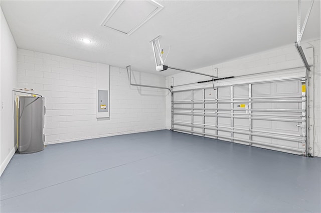 garage featuring a garage door opener and electric panel