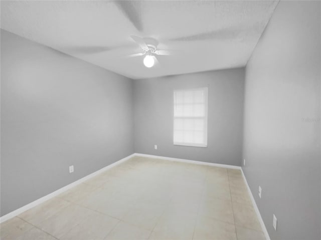 empty room featuring ceiling fan