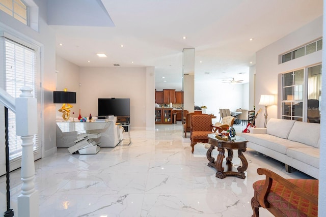 living room with ceiling fan