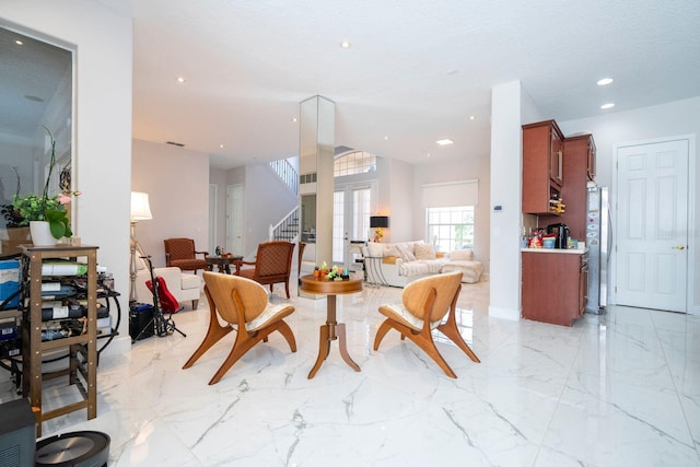 living room with a textured ceiling