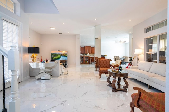 living room featuring ceiling fan