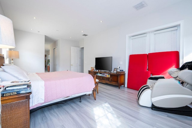 bedroom with light wood-type flooring