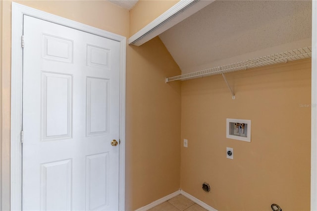 laundry room with washer hookup, hookup for an electric dryer, and light tile patterned floors