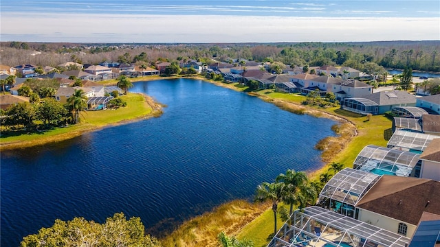 drone / aerial view with a water view