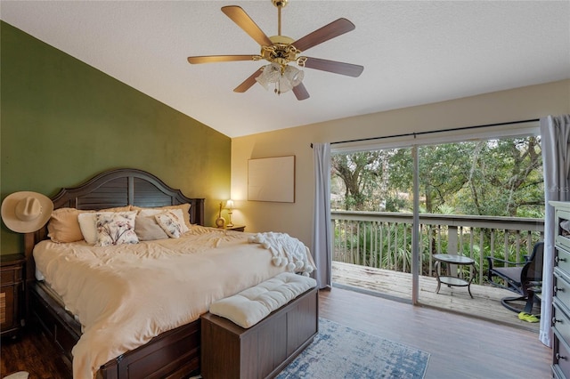 bedroom with lofted ceiling, hardwood / wood-style flooring, access to outside, and ceiling fan