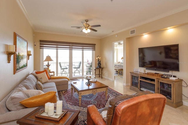 tiled living room featuring ceiling fan and ornamental molding