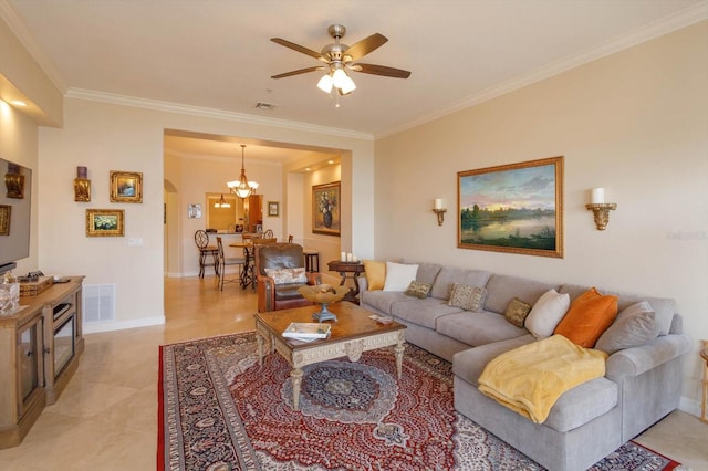 living room with ornamental molding and ceiling fan with notable chandelier