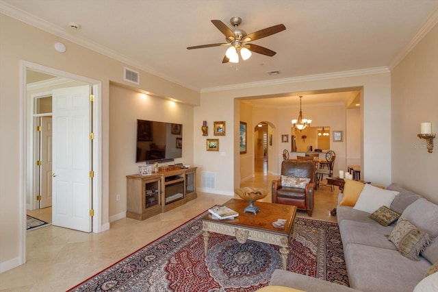 living room featuring crown molding and ceiling fan with notable chandelier