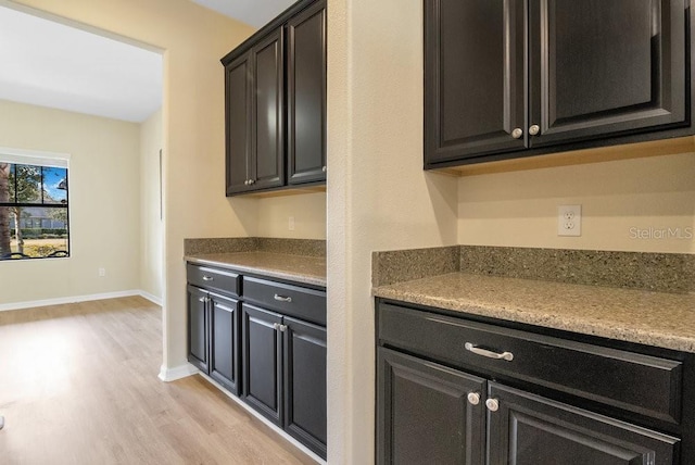 kitchen with light hardwood / wood-style floors