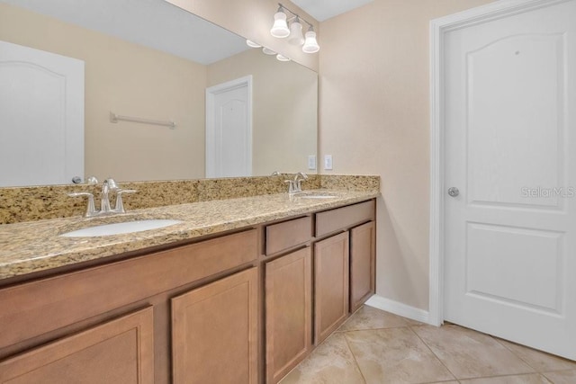 bathroom featuring tile patterned floors and vanity