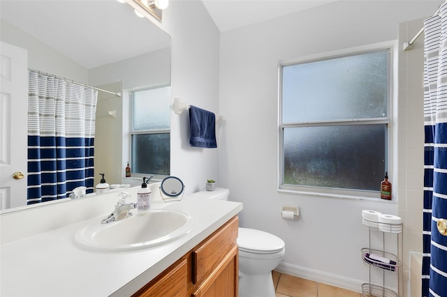 bathroom featuring vanity, toilet, curtained shower, and tile patterned flooring