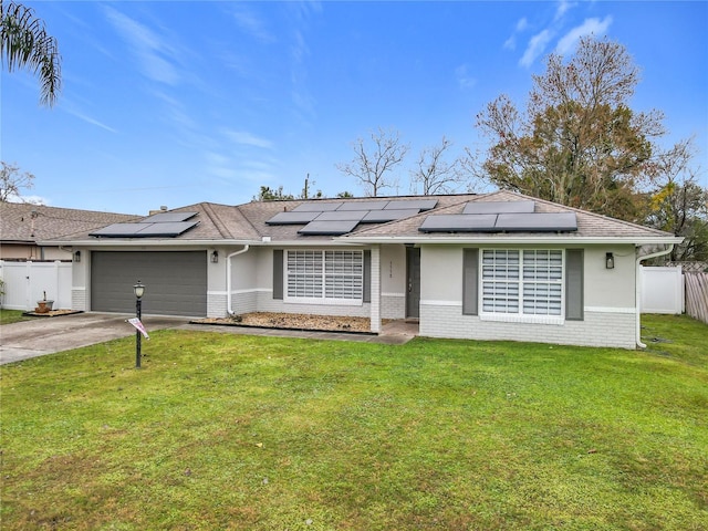 ranch-style house with a garage and a front yard