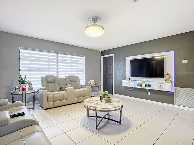 living room with light tile patterned flooring