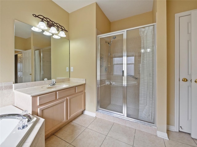 bathroom with vanity, independent shower and bath, and tile patterned flooring