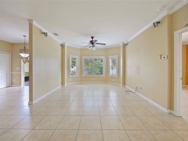 empty room with light tile patterned floors, ceiling fan with notable chandelier, and ornamental molding