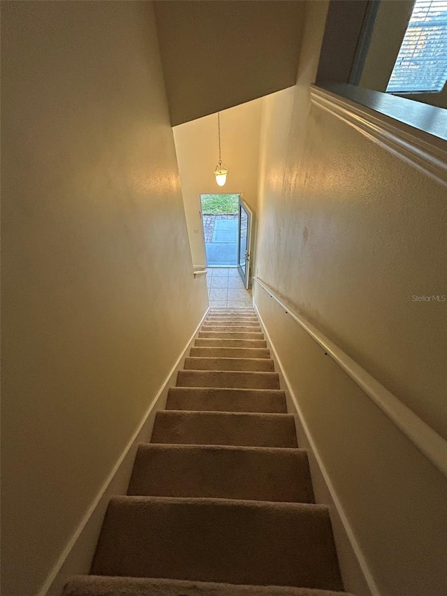 stairs with a high ceiling