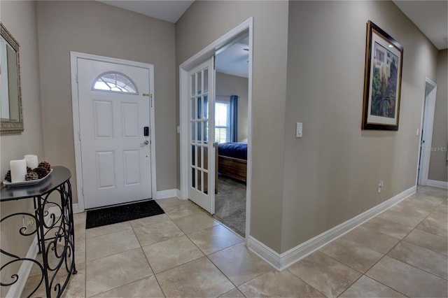 view of tiled foyer entrance