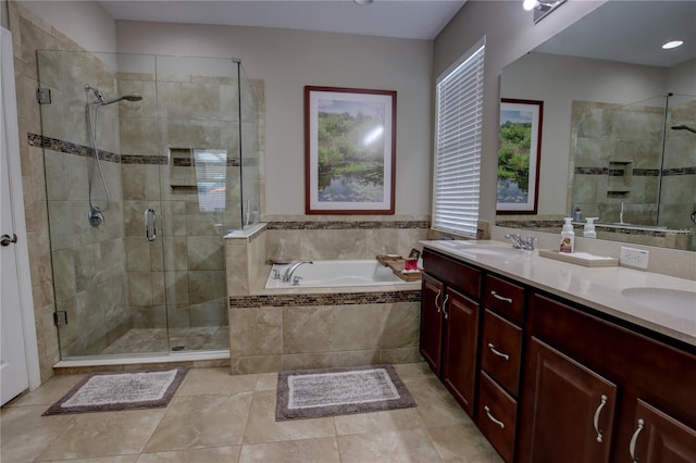 bathroom with vanity, separate shower and tub, and tile patterned flooring