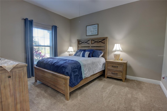 bedroom with light carpet