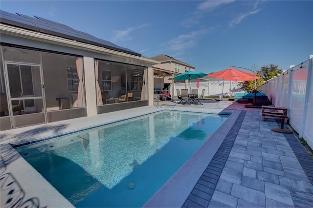 view of pool featuring a patio area