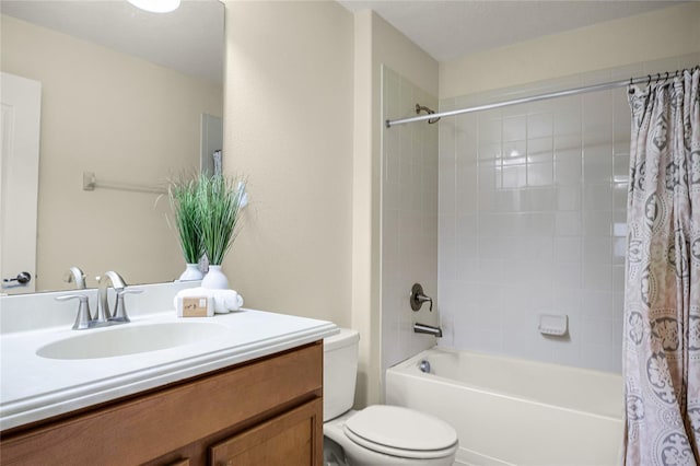 full bathroom with shower / bath combination with curtain, vanity, and toilet