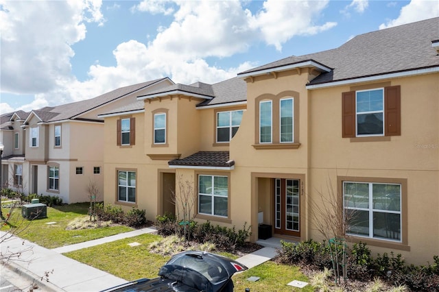 view of property with a front lawn