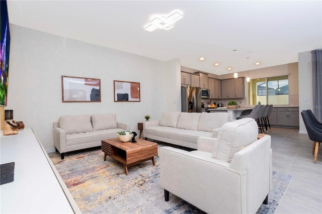 living room featuring light tile patterned floors